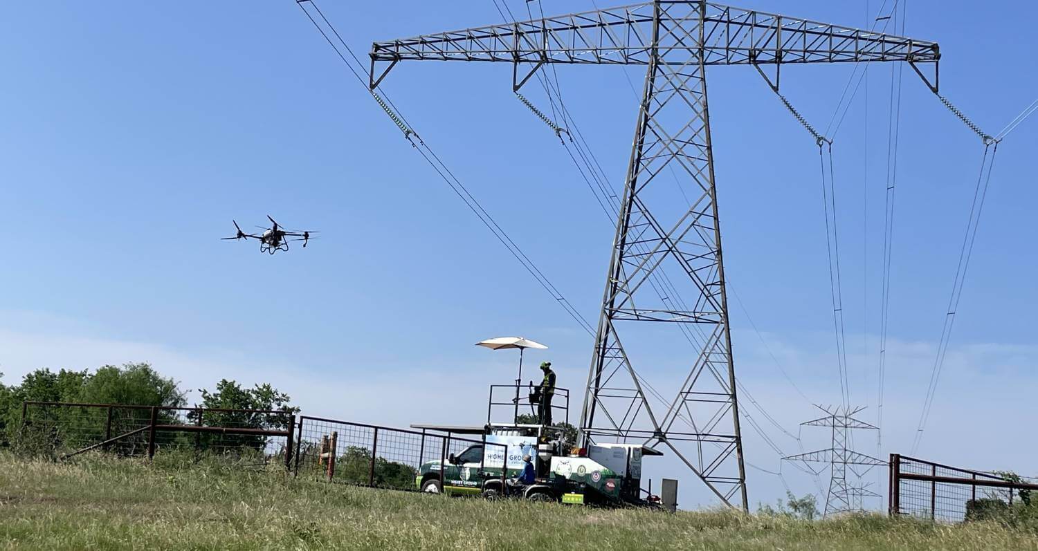 team operating drones on ranch land, texas higher ground aerial